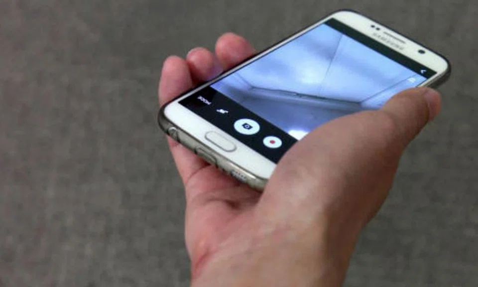 Cheng Sheng Min had recorded 7 upskirt videos on his mobile phone (Photo Illustration: The New Paper)