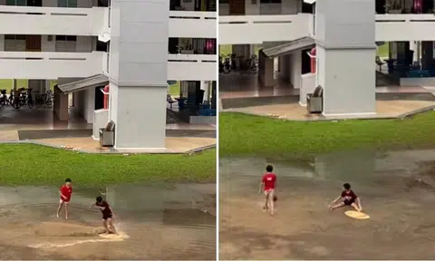 boys surf in puddle after the rain