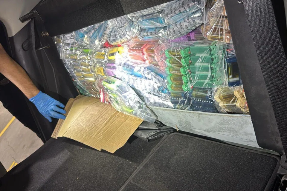 More than 1,100 e-vaporisers were concealed in the modified rear back seat of the Malaysia-registered car.