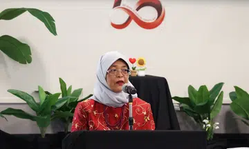 halimah yacob says she restrains herself from patting childrens heads
