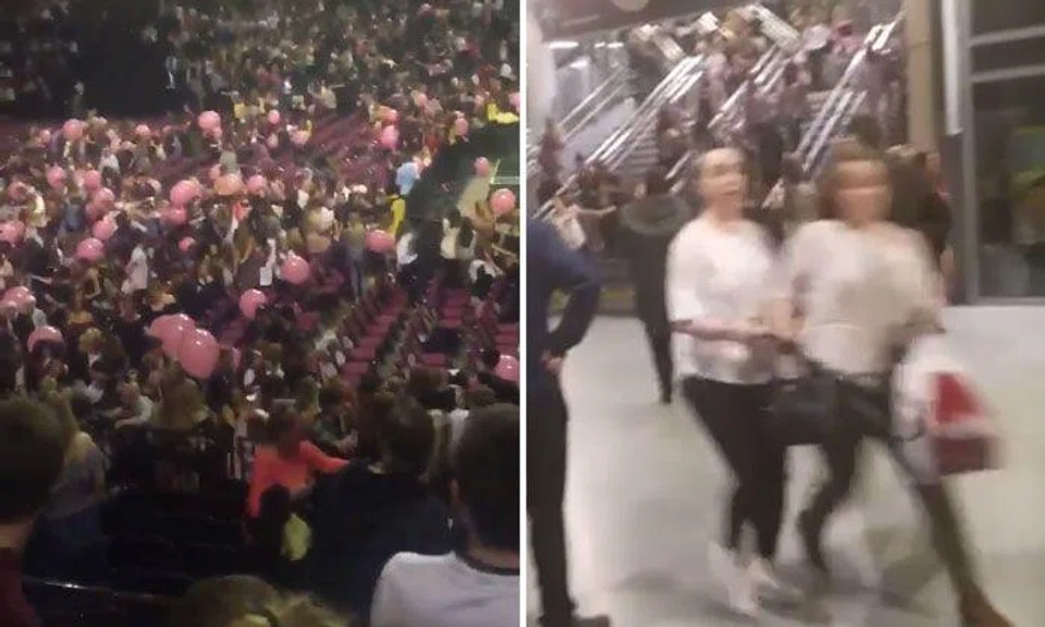 Panic and screams as Ariana Grande fans rush to get out of concert venue after explosions leave 22 dead, 50 injured
