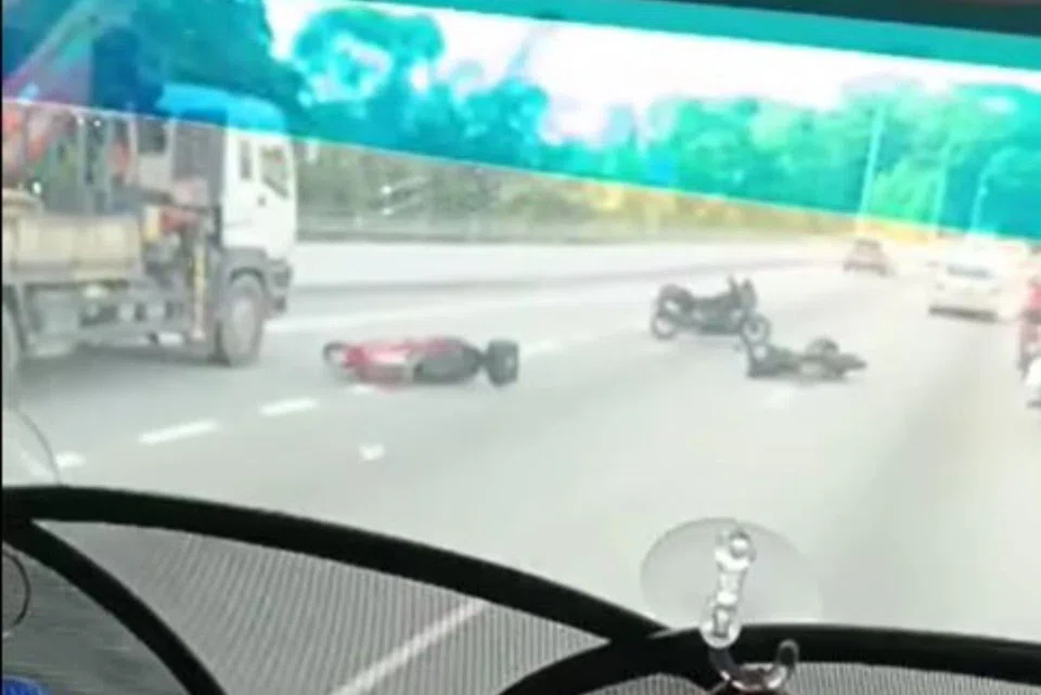 Video footage showing two motorcycles on the expressway, with another parked close by, following the accident on the BKE on May 26.