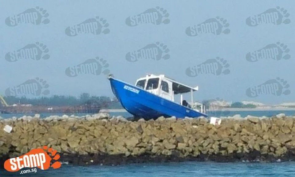 Boat is beached at Tuas View
