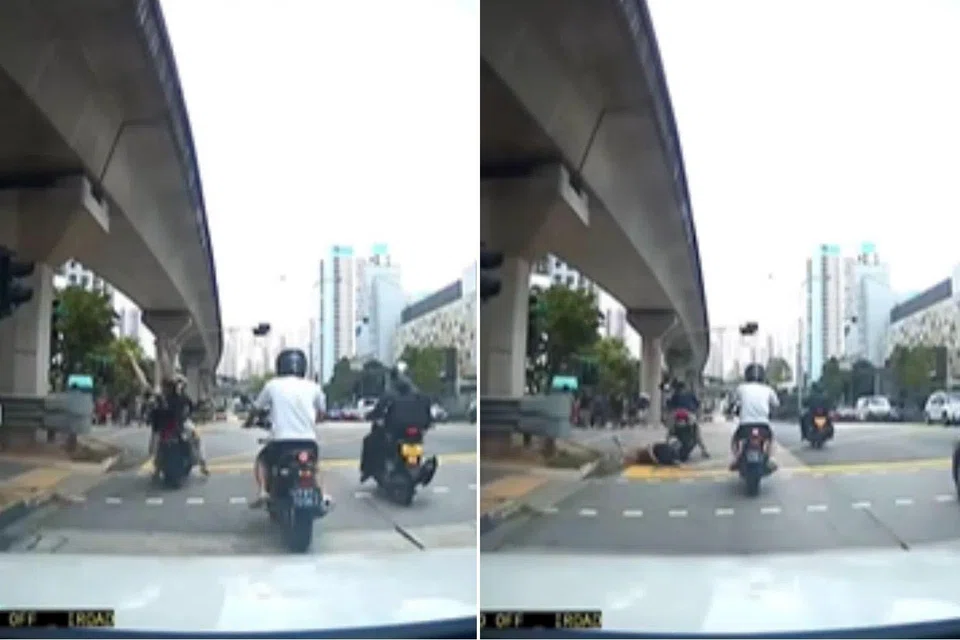 The passenger stands up shortly after the fall, appearing unharmed.