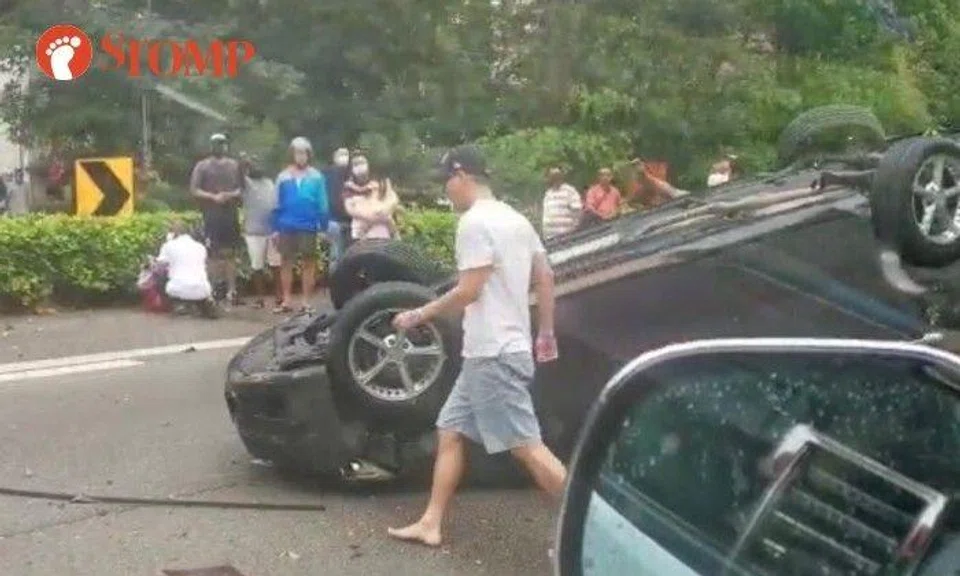 Car overturns after accident on PIE