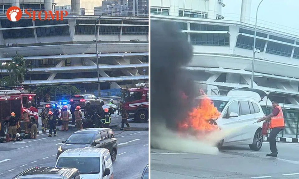 smrt bus captain uses fire extinguisher to put out car fire bukit timah