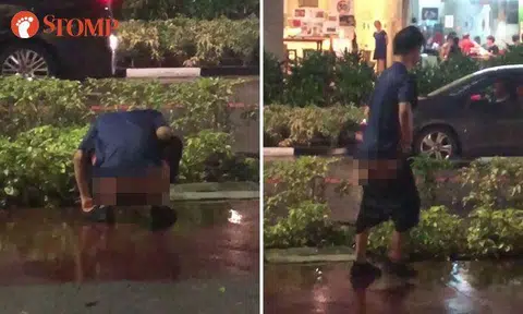 Man brazenly takes a dump in public next to Bras Basah MRT Station