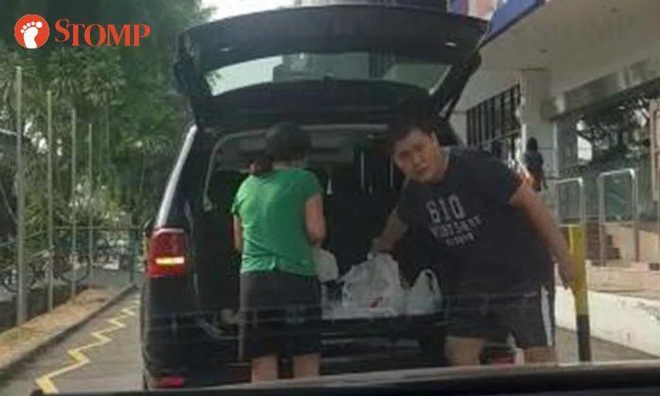 Driver stops along road with single yellow zig-zag line and takes pictures of Stomper when he saw her filming