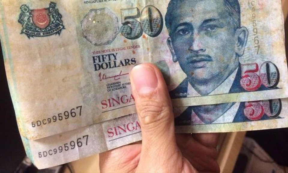 Heard of the fake $50 scare in Hougang? Here's how to differentiate real and fake notes