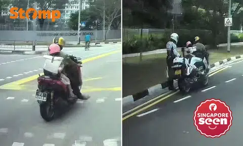 Motorcyclist with young child riding pillion stopped by TP at Punggol Way