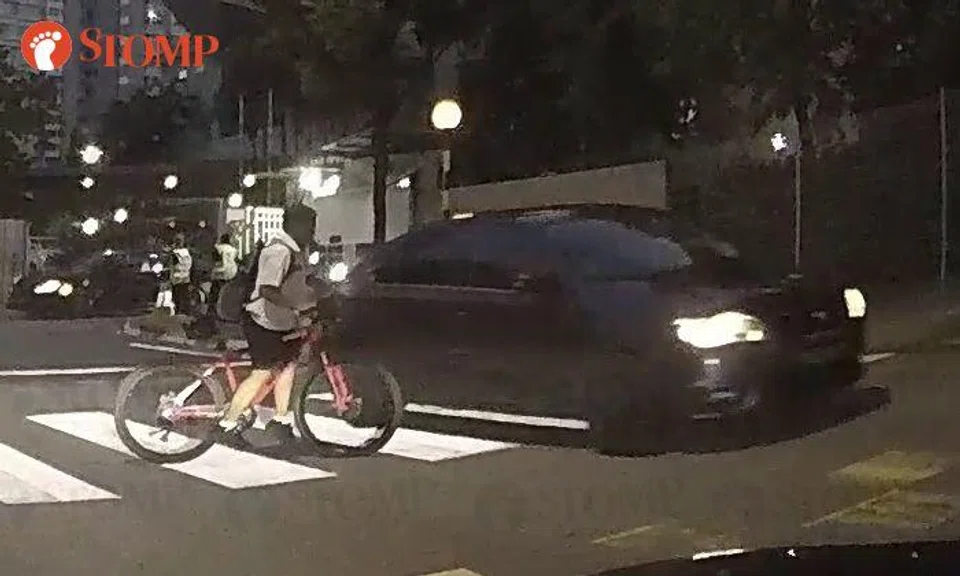 Schoolboy on bicycle nearly hit by car at Sengkang zebra crossing