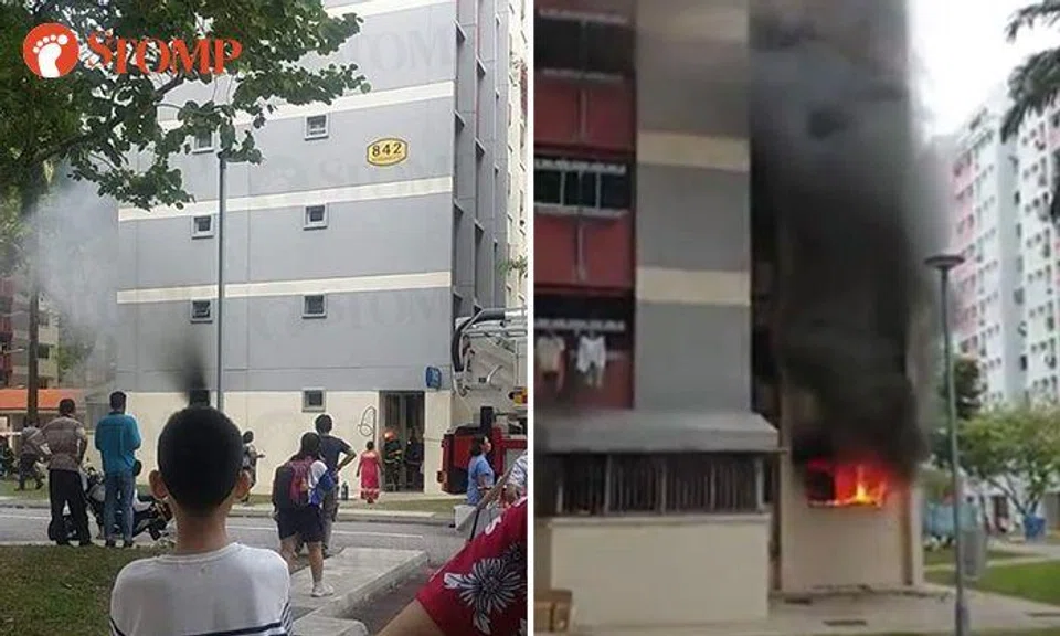 Fire involving air-conditioner breaks out at Woodlands HDB flat, explosions heard