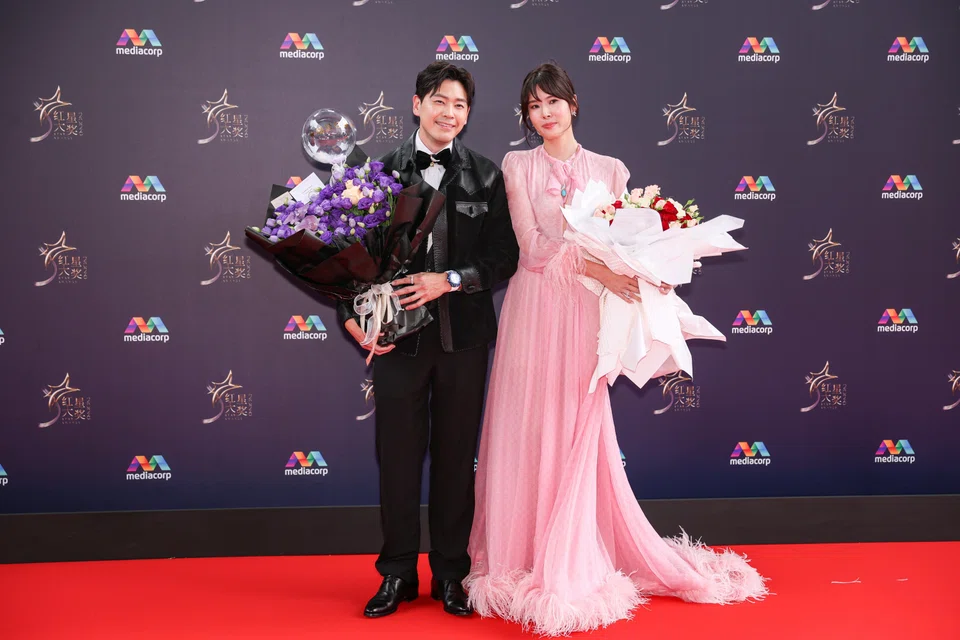Actor Romeo Tan and actress Carrie Wong on the red carpet at the Star Awards at Mediacorp on April 19. 