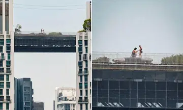 passer-by accidentally captures proposal at the pinnacle@duxton