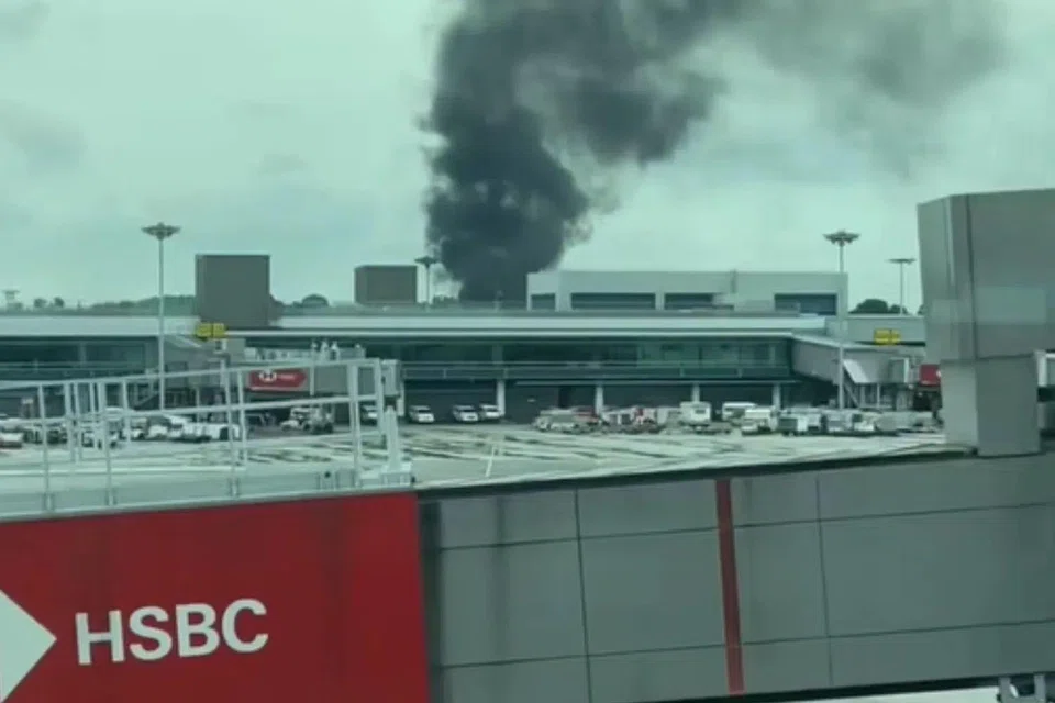 Passenger waiting to board their flight spotted the smoke.