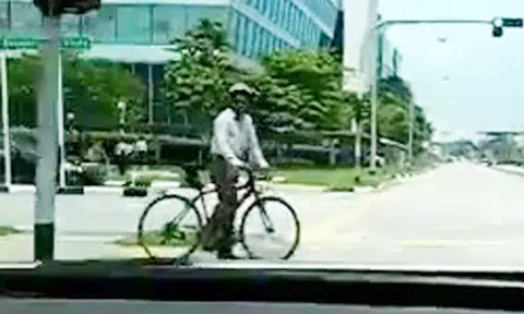 Lucky cyclist lives to see another day after nearly cycling into path of oncoming car