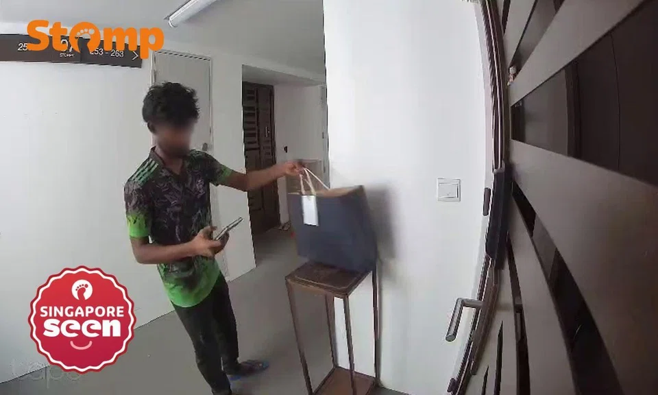 man steals parcel from outside tengah flat