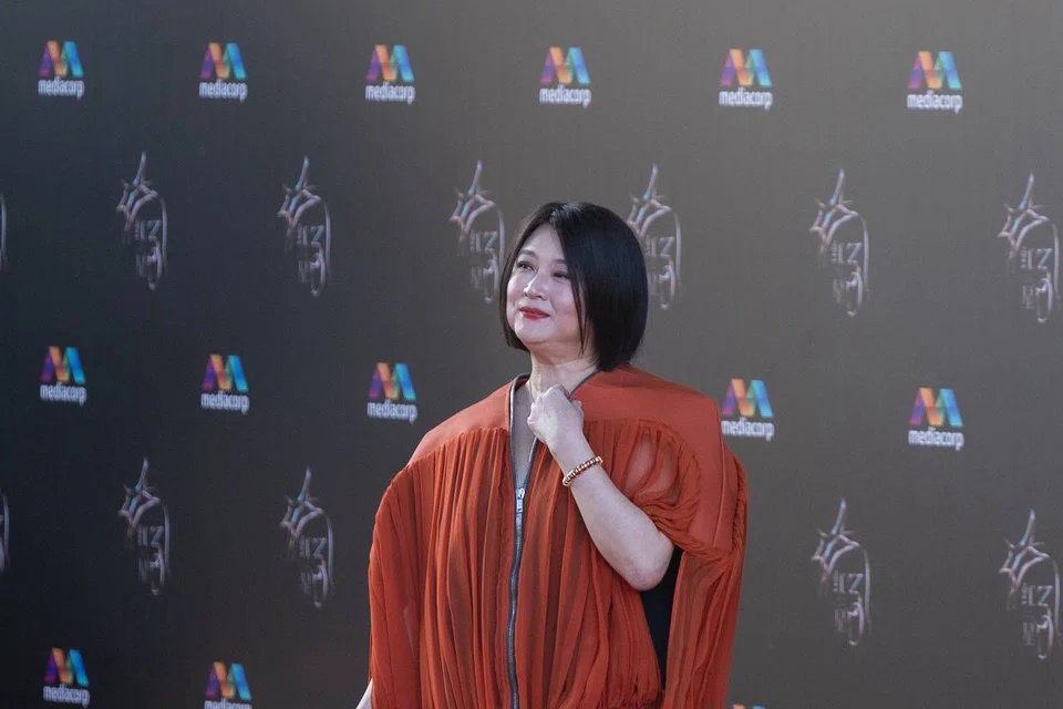 Chen Liping walking the red carpet at the Star Awards ceremony at Mediacorp on July 6.