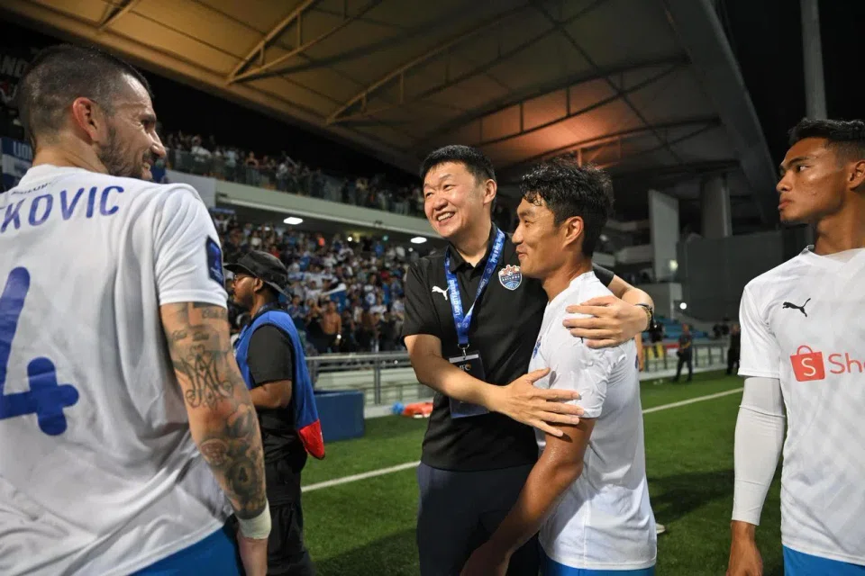 Lion City Sailors chairman Forrest Li embraces Song Ui-young after the team's 2-0 win over Sydney FC at Jalan Besar Stadium on April 9.