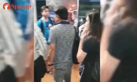 Passengers alight at Bukit Panjang LRT Station after services suspended due to traction power trip