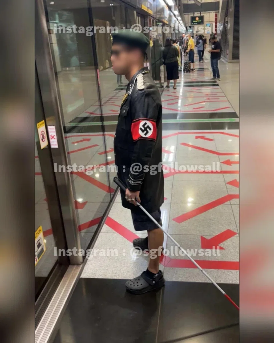 Man cosplaying as blind Nazi officer in casual wear