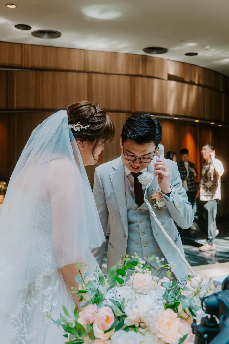 A pair of newly-weds leaving themselves a message on their wedding day with their video guest book by Lovewaves.