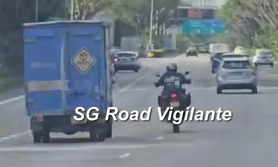Netizens pick sides between motorcyclist and ezbuy lorry driver as they try to overtake each other