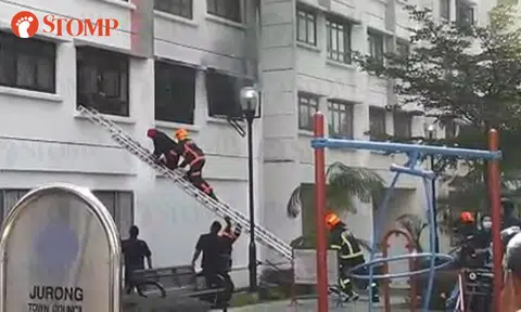 SCDF officers rescue residents after fire breaks out at Blk 372 Jurong East Street 32, 7 sent to hospital