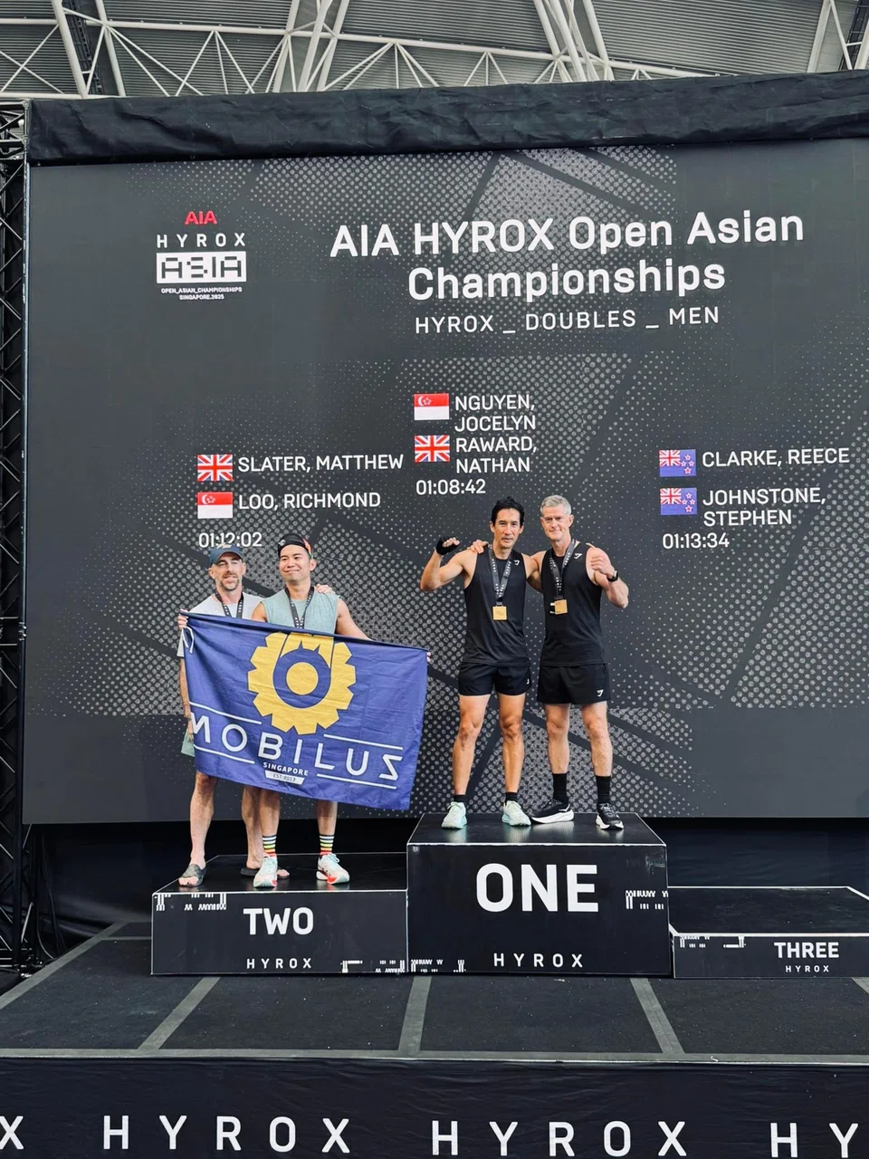 Mr Richmond Loo (second from left) and Mr Matthew Slater (far left) came in second in the 45-to-49 age group at the AIA Hyrox Open Asian Championships in June.