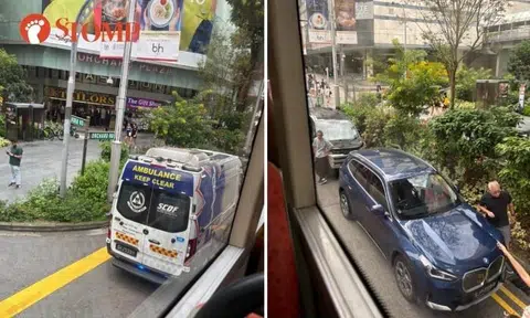 Ambulance spotted near Orchard Plaza after accident involving BMW and Toyota