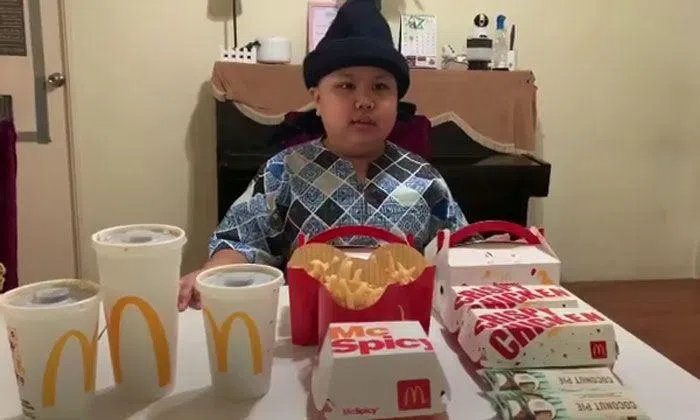McDonald's arranges Hari Raya surprise for young fan with mild autism ...