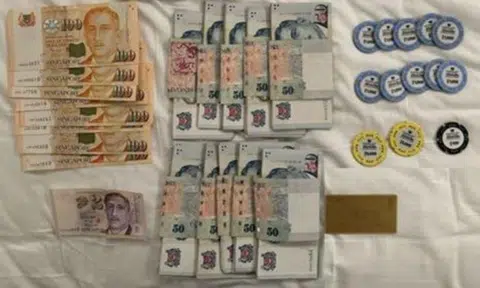 Over $140,000 worth of casino chips and cash and an array of handphones were seized.