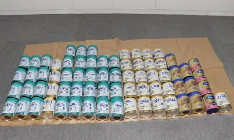 The police said 71 tins of milk powder worth about $4,000 were recovered.