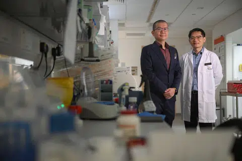 Kitkoji CEO Ken Koh (left) poses with Prof Jason Chan, the director of the Cancer Discovery Hub at the National Cancer Centre Singapore.