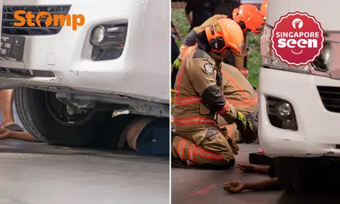 Man trapped under van in Bedok North void deck, rescued by SCDF with hydraulic equipment