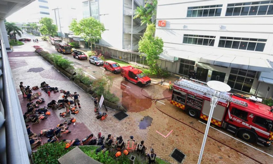 SCDF said the fire involved a server rack and was put out with a dry powder fire extinguisher. ST PHOTO: AZMI ATHNI