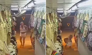 Phuket tourist incident, public urination, beachwear shop