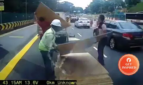 Kudos to these selfless guys for helping driver with load that fell off truck