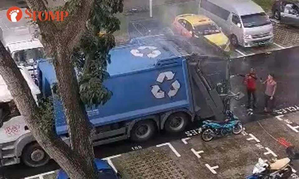Recycling truck catches fire in Bedok