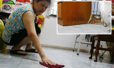 Ms Yang said she has to wipe her floor several times a day, and some furniture pieces in her house have become mouldy. PHOTO: LIANHE WANBAO