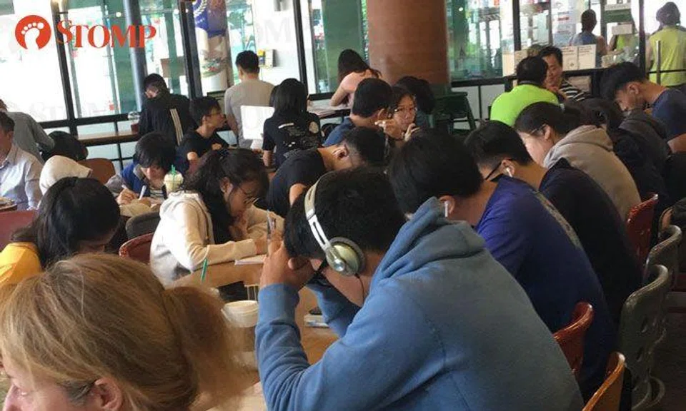 Woman annoyed with students taking up seats at Bishan Starbucks during school holidays: "Stay home and study"