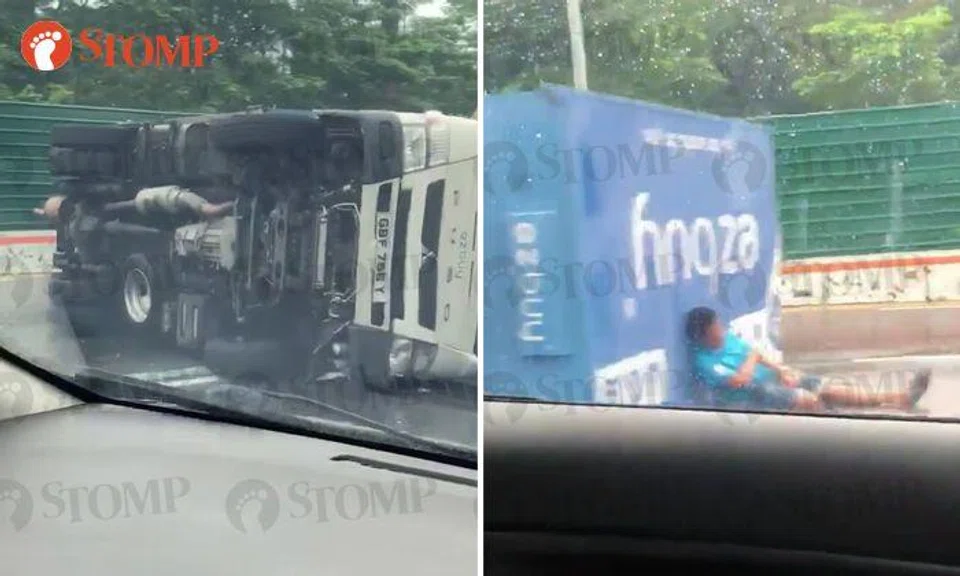 Driver taken to hospital after ezbuy lorry overturns along Lornie Road