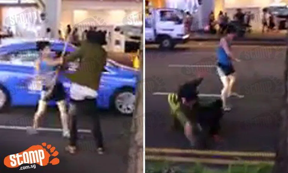 Driver gets harassed by drunk dude along Orchard Road -- then pushes him and hits him in head with pole