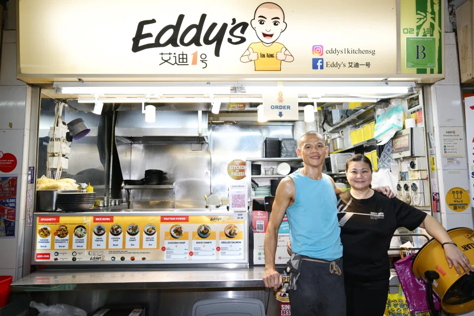 Mr Wan runs his hawker stall with his wife Serene Tan. ST PHOTO: NG SOR LUAN