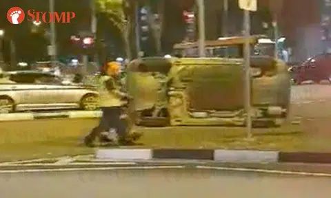 Car left lying on its side after accident at Sengkang Central