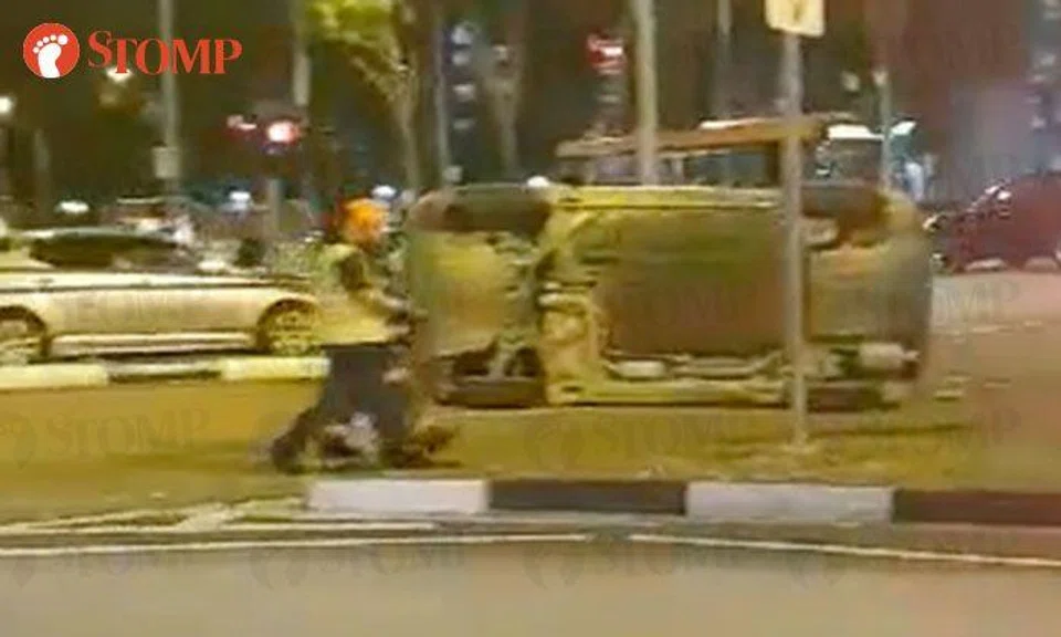 Car left lying on its side after accident at Sengkang Central