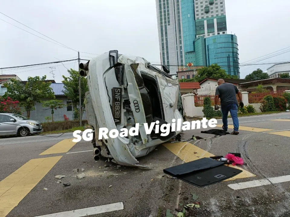 The rear windscreen was shattered and the body of the car was crumpled. PHOTO: SG ROAD VIGILANTE/FACEBOOK
