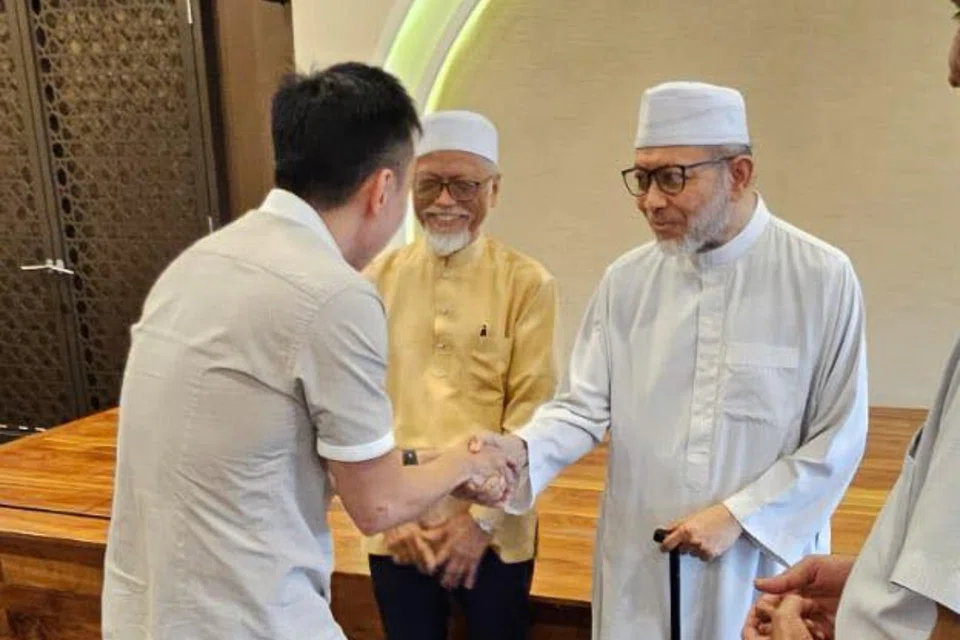 (From left) Former NMP Calvin Cheng met Ustaz Pasuni Maulan and Ustaz Mohamad Hasbi Hassan at Yusof Ishak Mosque in Woodlands on April 9. 