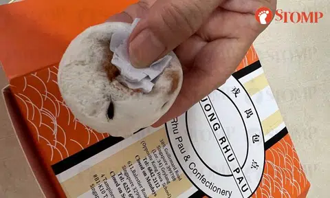 Man gets nasty surprise after peeling paper off char siew bun from Tampines stall