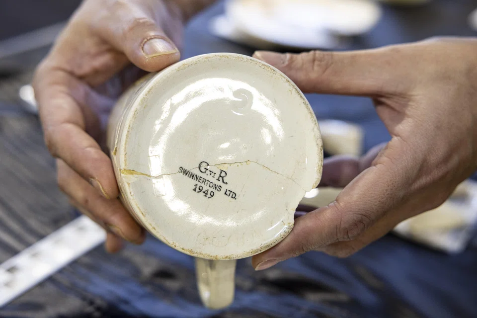 A broken Swinnertons mug that was found near Block 21 dates back to 1949 and bears the mark of King George VI.